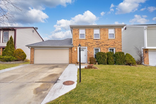 view of front of property with a garage and a front yard