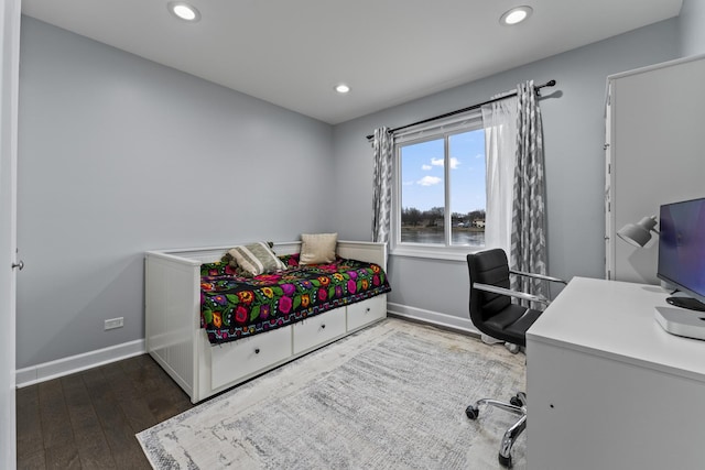 bedroom featuring hardwood / wood-style floors