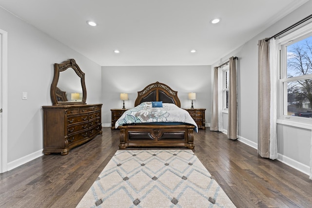 bedroom featuring dark hardwood / wood-style flooring