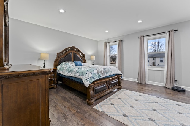 bedroom with dark wood-type flooring