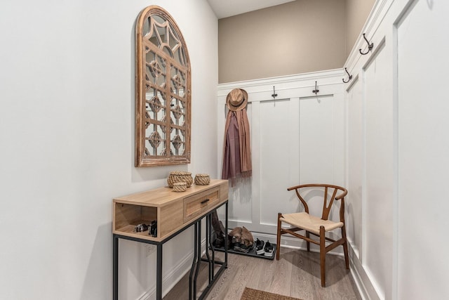 mudroom with hardwood / wood-style flooring