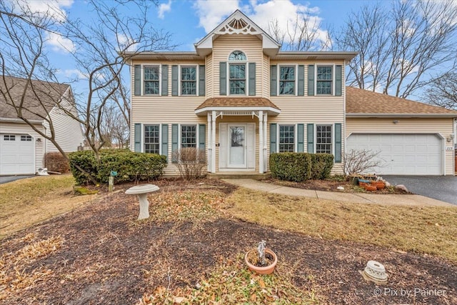 view of front of home with a garage