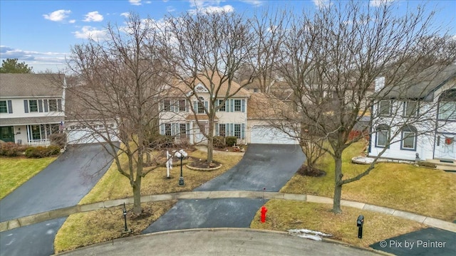 view of front of home with a front lawn