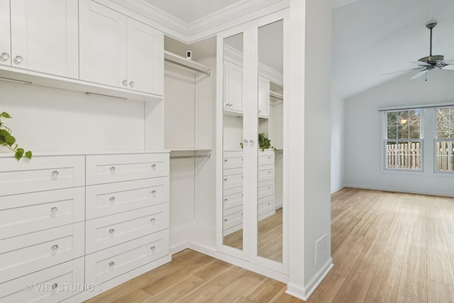 walk in closet featuring ceiling fan and light hardwood / wood-style floors