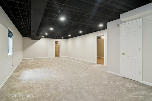 basement featuring carpet floors