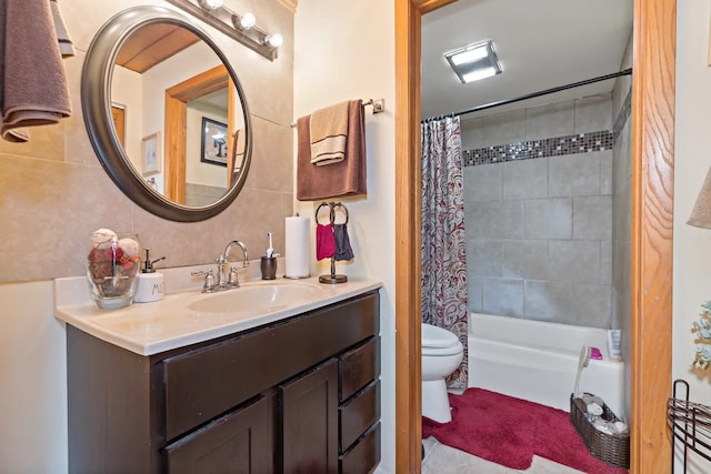 full bathroom featuring tasteful backsplash, tile walls, shower / bath combination with curtain, vanity, and toilet