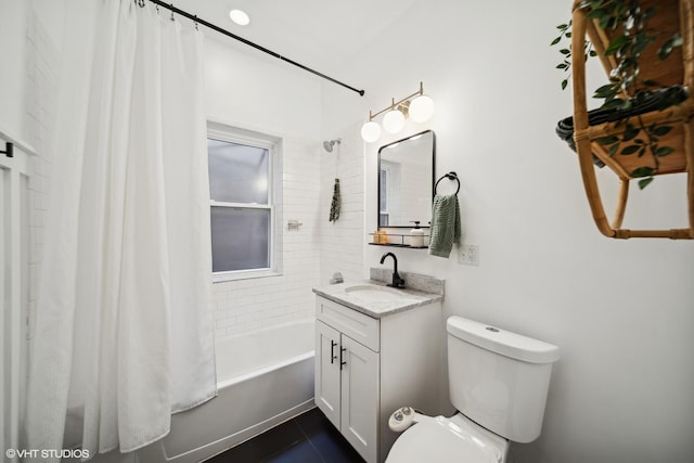 full bathroom featuring vanity, shower / bathtub combination with curtain, and toilet