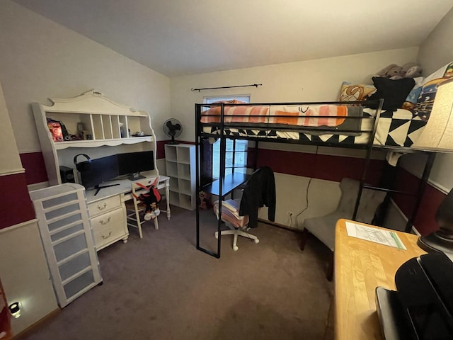 carpeted bedroom featuring lofted ceiling