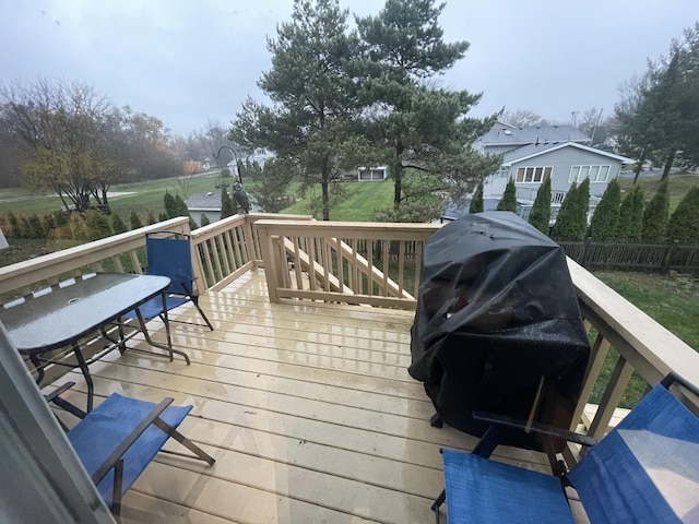 wooden deck with area for grilling