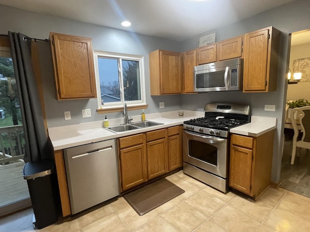 kitchen featuring stainless steel appliances and sink