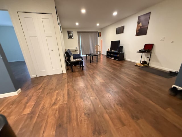 living area featuring dark hardwood / wood-style flooring