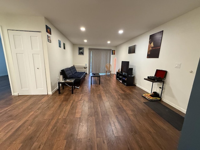 sitting room featuring dark hardwood / wood-style floors