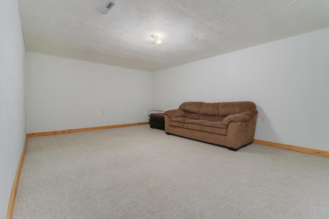 sitting room with light colored carpet