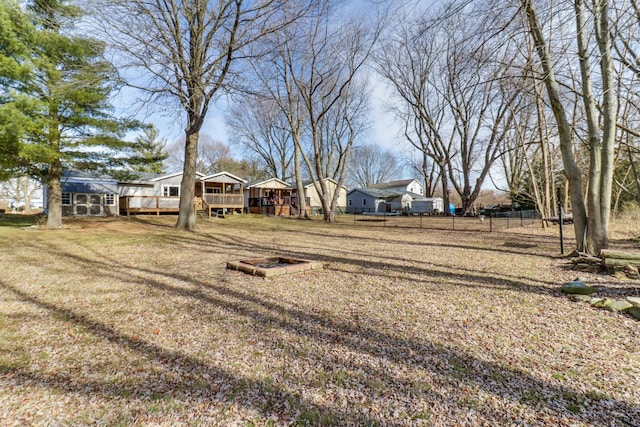 view of yard with a wooden deck