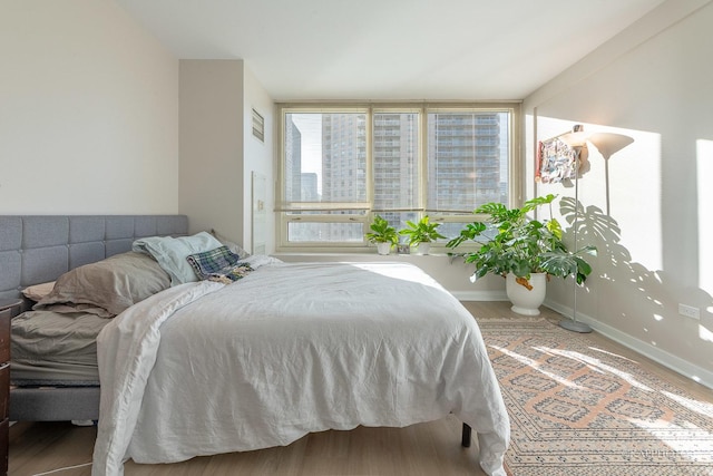 bedroom with multiple windows