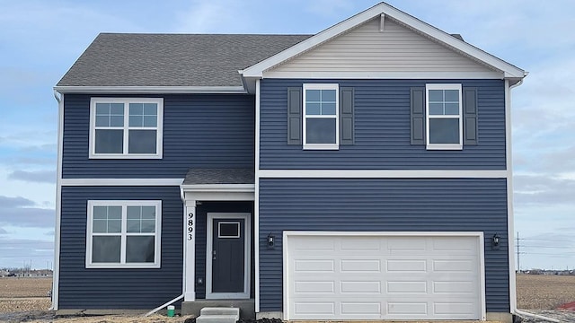 view of front facade featuring a garage