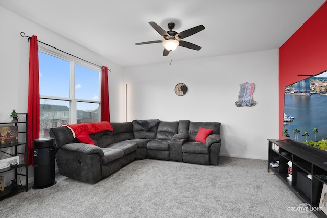 carpeted living room featuring ceiling fan