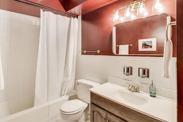 full bath featuring toilet, shower / bath combination with curtain, tile walls, and vanity