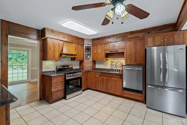 6N356 Dunham Rd, Wayne, IL 60184 - kitchen with stainless steel appliances, custom range hood, brown cabinets, decorative backsplash, and light tile patterned flooring