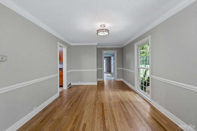 6N356 Dunham Rd, Wayne, IL 60184 - unfurnished dining area with wood finished floors and ornamental molding