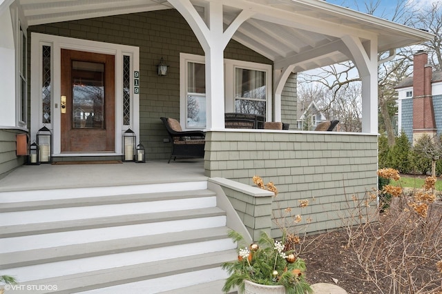 property entrance with a porch