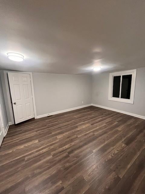 empty room featuring dark hardwood / wood-style floors