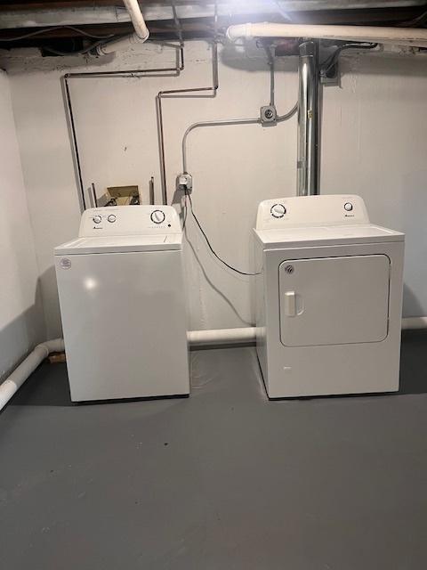 laundry area with washer and dryer