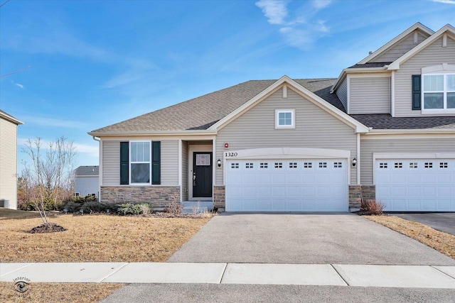 craftsman inspired home featuring a garage