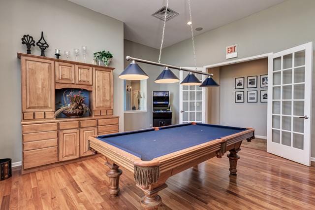 playroom featuring pool table and light hardwood / wood-style flooring