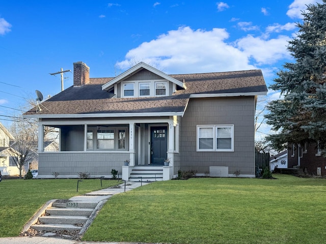 view of front of house with a front lawn