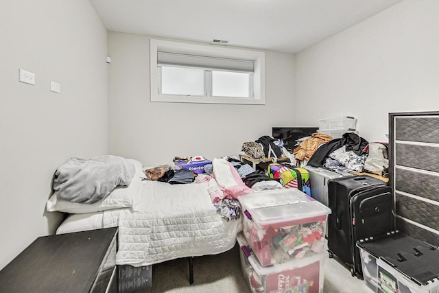 carpeted bedroom with visible vents