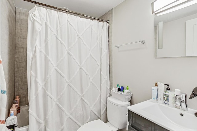 full bathroom featuring toilet, shower / bath combination with curtain, and vanity