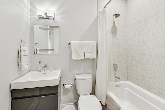 full bath featuring vanity, toilet, and shower / bath combo with shower curtain