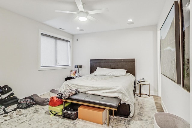 bedroom with visible vents, baseboards, a ceiling fan, light wood-style flooring, and recessed lighting