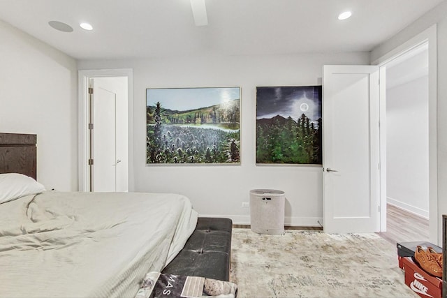 bedroom with ceiling fan, baseboards, wood finished floors, and recessed lighting