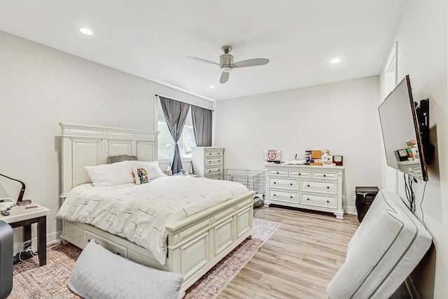 bedroom with baseboards, recessed lighting, light wood-style flooring, and a ceiling fan