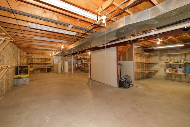 basement featuring water heater