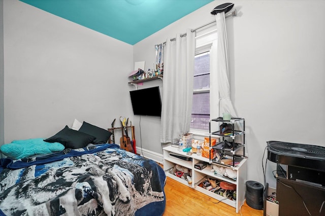 bedroom featuring wood-type flooring