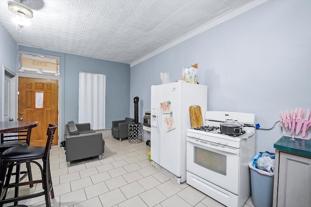 kitchen featuring white appliances and ornamental molding