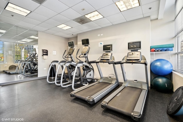 exercise room with a drop ceiling