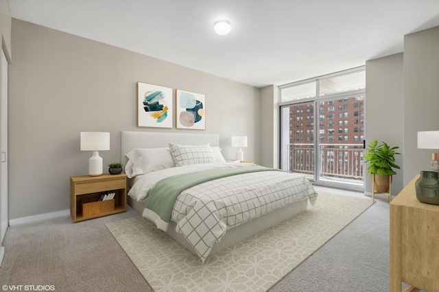 bedroom with light colored carpet, access to exterior, and a wall of windows