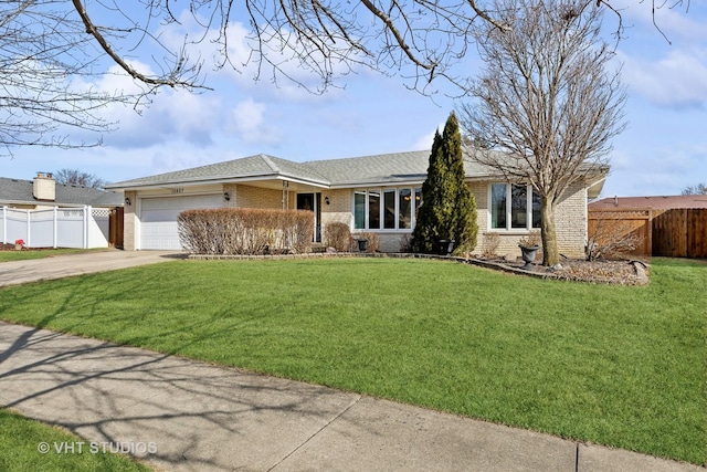 ranch-style house with a garage and a front yard