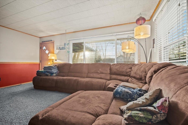 living room with crown molding and carpet flooring