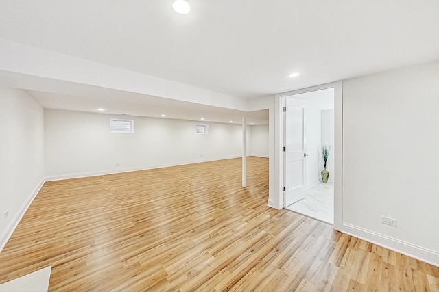 basement with light wood-type flooring