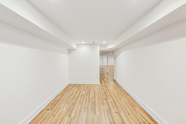 basement featuring light wood-type flooring