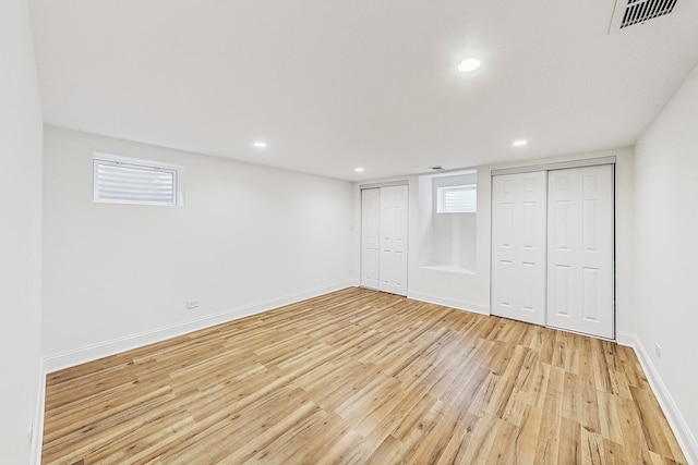 basement with light wood-type flooring