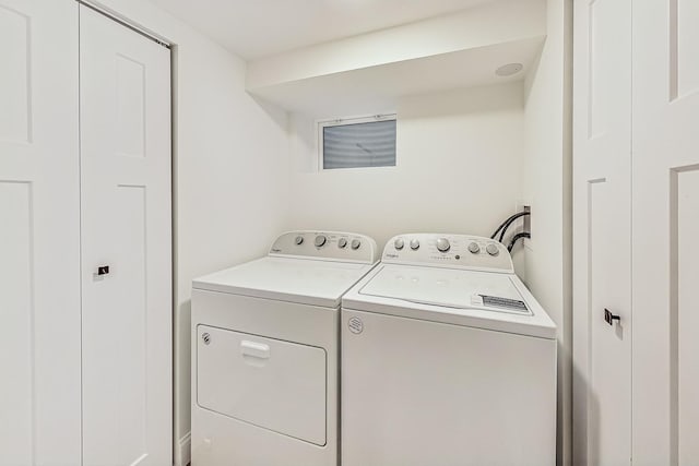 washroom with separate washer and dryer