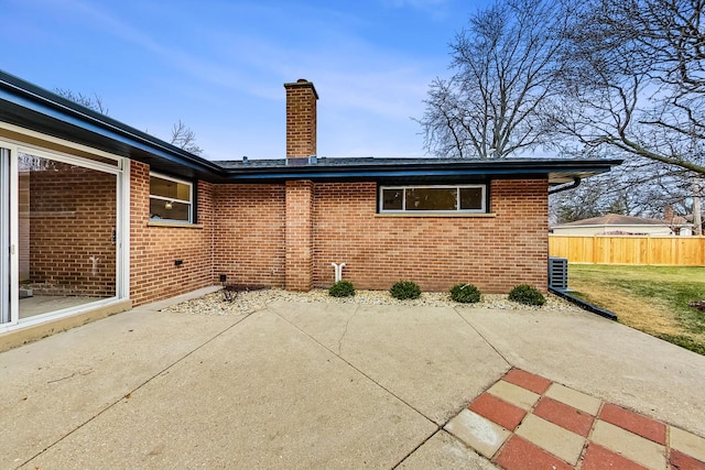 back of property featuring a patio area