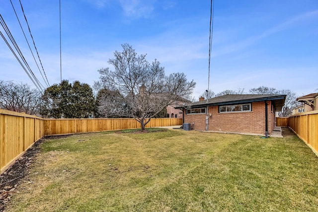 view of yard featuring central AC