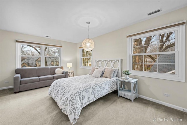 bedroom featuring carpet, visible vents, and baseboards